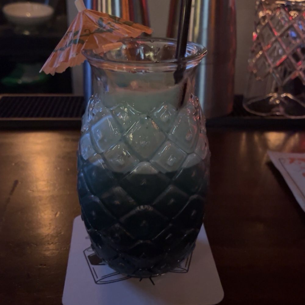 "Bikini Bottom Sling" the first drink I ordered and my favorite. Very nice fruity taste and great presentation. "Bikini Bottom Sling" the first drink I ordered and my favorite. Very nice fruity taste and great presentation.
