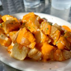 Si Tapas - Patatas Bravas