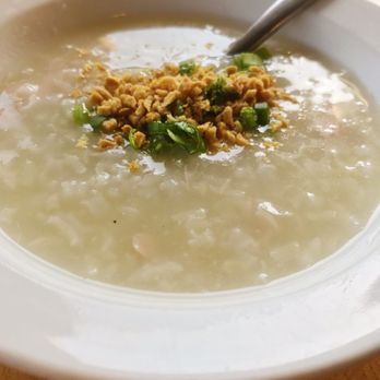 Bonifacio - Arroz caldo - Chicken and rice congee/porridge topped with fried garlic - Filipino Near Me - Columbus, Ohio Bonifacio - Arroz caldo - Chicken and rice congee/porridge topped with fried garlic - Filipino Near Me - Columbus, Ohio