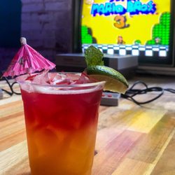 Round Two - Peach's Parasol cocktail with our Nintendo video game