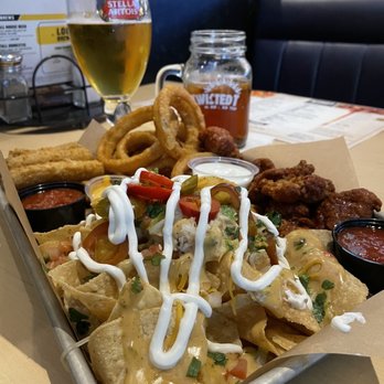 Buffalo Wild Wings - Samplers platter..... hot, fresh, crispy O rings, nachos with the works, boneless wings & 3 dipping sauces of my choice. Hit the spot! - Chicken Wings Near Me - Surprise, Arizona Buffalo Wild Wings - Samplers platter..... hot, fresh, crispy O rings, nachos with the works, boneless wings & 3 dipping sauces of my choice. Hit the spot! - Chicken Wings Near Me - Surprise, Arizona