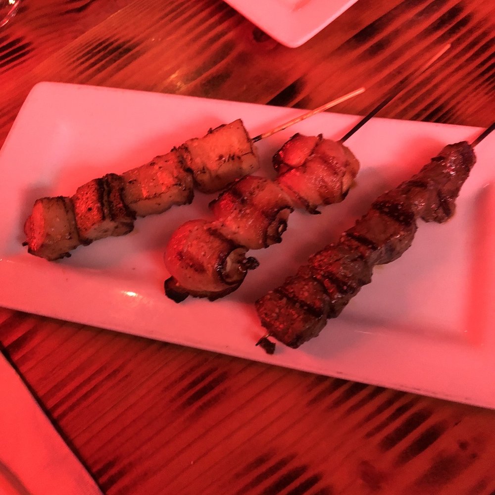 Umami - Robata- pork belly, bacon wrapped quail egg, wagyu beef (left to right) - Sushi Bars Near Me - Pittsburgh, Pennsylvania Umami - Robata- pork belly, bacon wrapped quail egg, wagyu beef (left to right) - Sushi Bars Near Me - Pittsburgh, Pennsylvania
