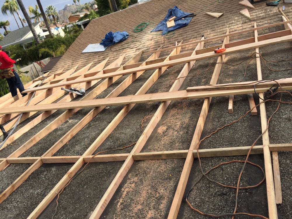 Slide of Al's roofing repairs