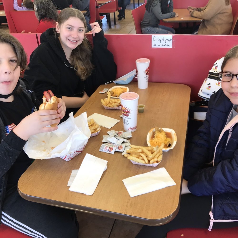 Enjoying a socially distanced lunch (4 to a table) Enjoying a socially distanced lunch (4 to a table)