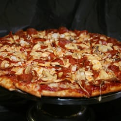 Tavern At The Creek - We create a mouth watering pizza using the finest ingredients including Grande Provolone cheese and an abundance of toppings