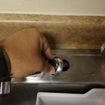 Alight Norman - Sink sprayer not actually attached to sink - University Housing Near Me - Norman, Oklahoma