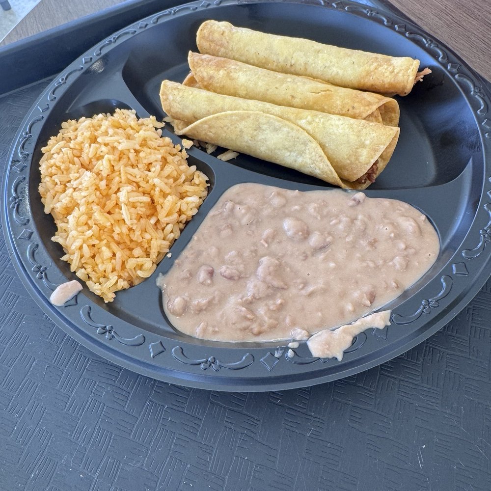 Chicken taquito plate. Chicken taquito plate.