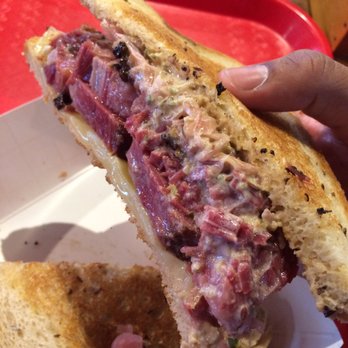 Roegels Barbecue - The Rueben moist flavorful smoked beef pastrami, sauerkraut salad, cheese, all on a toasted rye. Amazing - Barbeque Near Me - Houston, Texas
