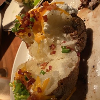 Houston's Restaurant - Very large potato! - Steakhouses Near Me - Pasadena, California Houston's Restaurant - Very large potato! - Steakhouses Near Me - Pasadena, California