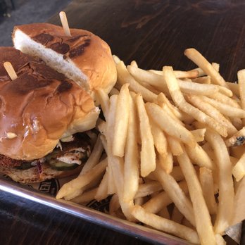 The Chicken Koop - The Chicken Koop's Spicy Fried Chicken Sandwich and fries. - New American Near Me - Whittier, California The Chicken Koop - The Chicken Koop's Spicy Fried Chicken Sandwich and fries. - New American Near Me - Whittier, California