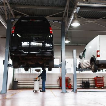 ServiceUp - Vans at a ServiceUp shop. - Auto Repair Near Me ServiceUp - Vans at a ServiceUp shop. - Auto Repair Near Me