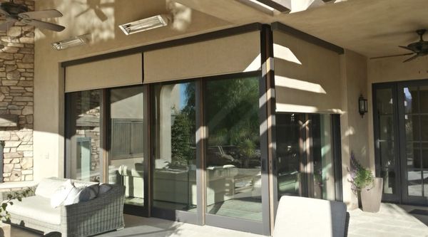 Automated Roller Shades - We offer an enormous library of materials, colors, and opacities to make sure you have the perfect window covering to complete your home or office design! Motorized roller shades are what you get when you add new technology to an original design. You can program any motorized window to a different channel on your wireless remote for the ultimate light utilization! Our motorization features can be added to any shade style or material! Many of our shade fabrics are resistant to the elements and are ideal for indoor and outdoor use. These are a very popular option in mid-century and modern home designs due to their high functionality and safety! Automated Roller Shades - We offer an enormous library of materials, colors, and opacities to make sure you have the perfect window covering to complete your home or office design! Motorized roller shades are what you get when you add new technology to an original design. You can program any motorized window to a different channel on your wireless remote for the ultimate light utilization! Our motorization features can be added to any shade style or material! Many of our shade fabrics are resistant to the elements and are ideal for indoor and outdoor use. These are a very popular option in mid-century and modern home designs due to their high functionality and safety!