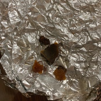 La Casa Del Pollo Peruano II - a piece of food wrapped in tin foil - Latin American Near Me - Jackson Heights, New York La Casa Del Pollo Peruano II - a piece of food wrapped in tin foil - Latin American Near Me - Jackson Heights, New York