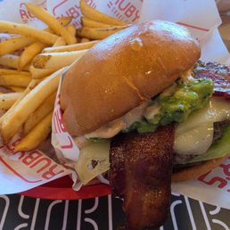 Bacon Guacamole burger with fries