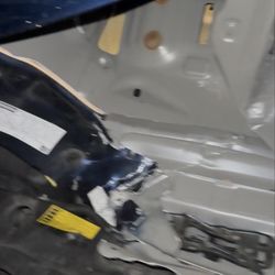 Capital City Collision Center - Hood damage and splitting