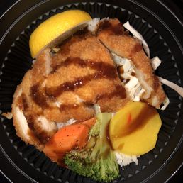 Chicken Cutlet Rice Bowl Over White Rice w/ Few Pieces of Veggies as Decorations (7 months ago) Chicken Cutlet Rice Bowl Over White Rice w/ Few Pieces of Veggies as Decorations (7 months ago)