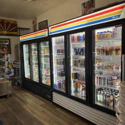 Sunshine Donuts & Cafe - Cold case of nonalcoholic drinks. Milk, tea, soda, water, seltzer, coffee drinks, juice, and energy drinks.