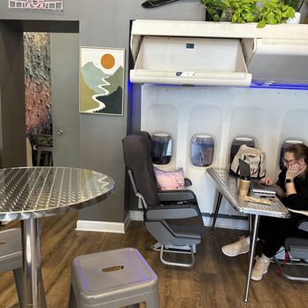 City Skyline Chicago Coffee Lounge - Real airline seats and overhead compartments l - Coffee & Tea Near Me - Chicago, Illinois City Skyline Chicago Coffee Lounge - Real airline seats and overhead compartments l - Coffee & Tea Near Me - Chicago, Illinois