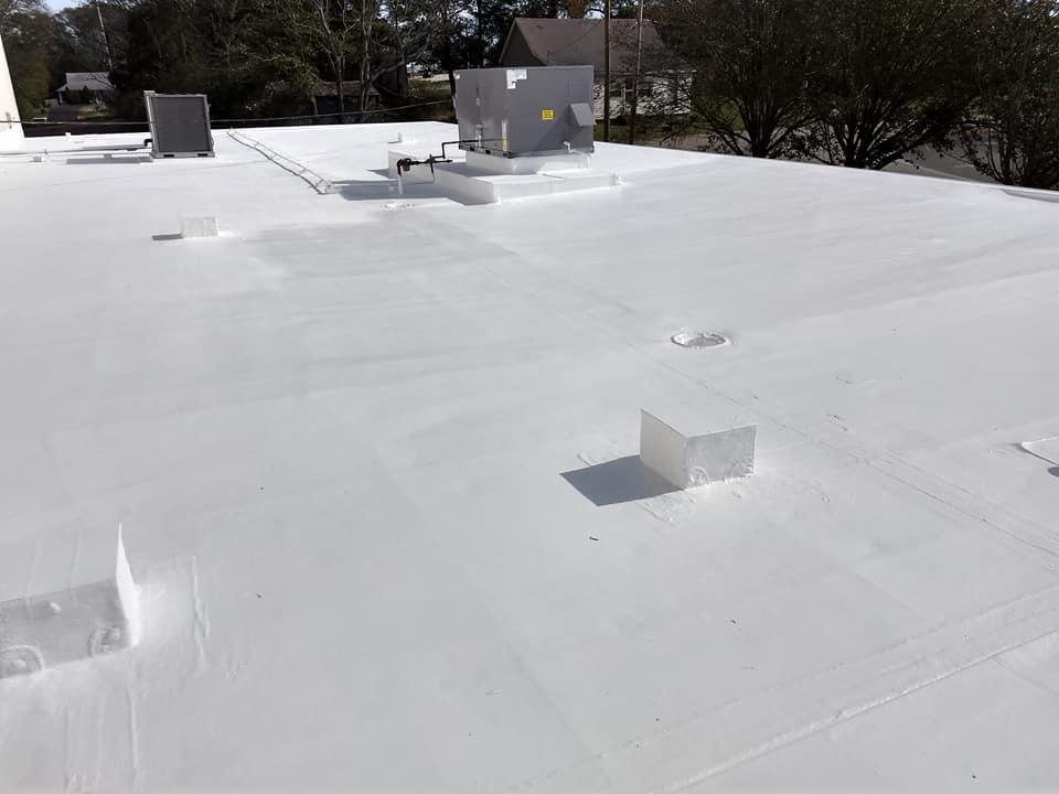 Slide of K & C Seamless Roofing
