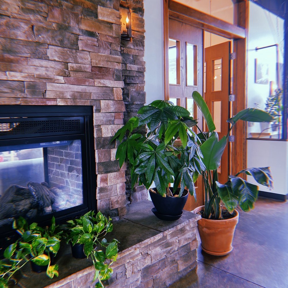 Coffea Roasterie - a fireplace and potted plants - Bakeries Near Me - Sioux Falls, South Dakota Coffea Roasterie - a fireplace and potted plants - Bakeries Near Me - Sioux Falls, South Dakota
