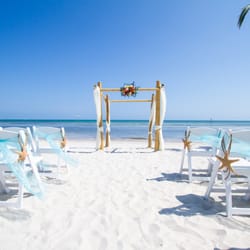 Cruise Planners - How about a destination Wedding - Vows on the white sand beach
