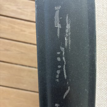 Colonial Van Lines - outdoor patio chair scratches on chair arm - Movers Near Me - Pompano Beach, Florida