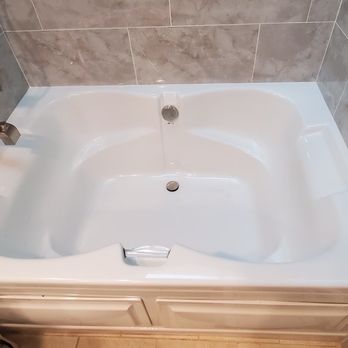 Creative Tile Services - After picture of the soaking tub Cesar installed - General Contractors Near Me