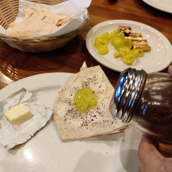 Heidar Baba - Top with butter, pepper, and sprinkle with seasoning - Middle Eastern Near Me - Pasadena, California