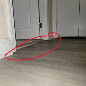 Optima Construction & Renovation - this shows the door frames not reaching the floor and an unsafe transition between rooms - Roofing Near Me - Northbrook, Illinois Optima Construction & Renovation - this shows the door frames not reaching the floor and an unsafe transition between rooms - Roofing Near Me - Northbrook, Illinois