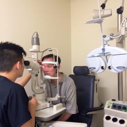 Dr. Tran conducting a comprehensive diabetic eye exam