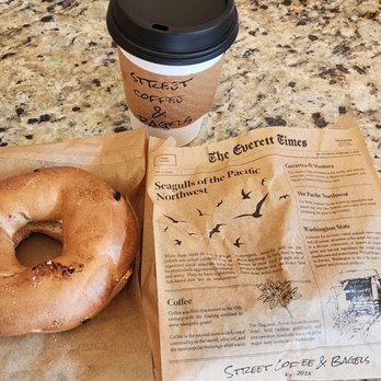 Street Coffee & Bagels - Cinnamon raisin bagel with cream cheese. White mocha. And an everything bagel with cream cheese inside the bag - Cafes Near Me - Everett, Washington
