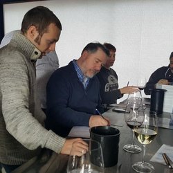 Seattle Urban Wine Tours - Reading tasting notes at Structure Cellars