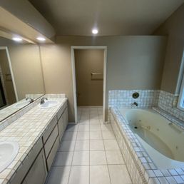 Old vanity and built in jacuzzi tub Old vanity and built in jacuzzi tub