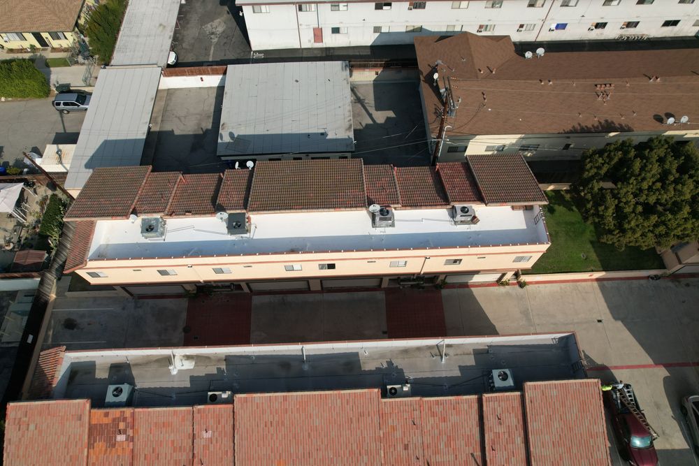 Slide of Enriquez Roofing