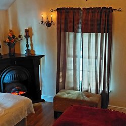 Angelface Day Spa - Our Couples Room Suite, finely appointed with a fireplace and private shower.