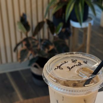 Common Ground - a cup of iced coffee on a table - Coffee & Tea Near Me - Tacoma, Washington Common Ground - a cup of iced coffee on a table - Coffee & Tea Near Me - Tacoma, Washington