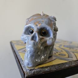 Homeport - Emaciated skull candle from Vernont Candleworks.