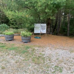 Bartlett Maine Estate Winery - Winery entrance through the woods