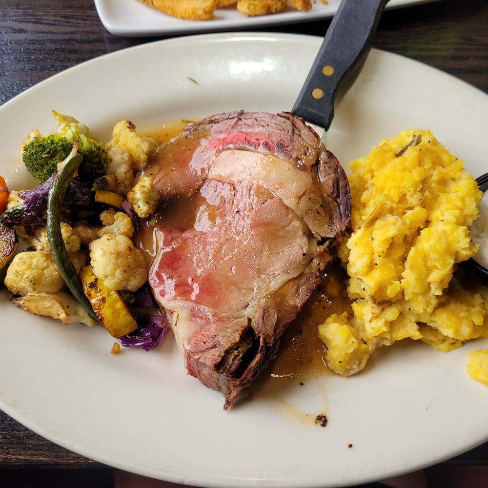 Grand Tavern Troy - 2024-08-01. Grand Tavern Troy. Prime Rib dinner (12oz - $18.00). Cooked to a nice medium rare. Served with garlic mash and grilled veggies. - New American Near Me - Troy, Michigan