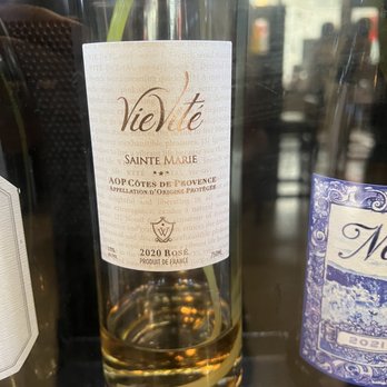 Sips Wine Bar - a glass of wine and a bottle of wine - Wine Bars Near Me - Safety Harbor, Florida Sips Wine Bar - a glass of wine and a bottle of wine - Wine Bars Near Me - Safety Harbor, Florida