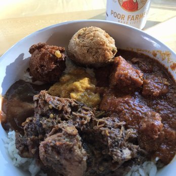 Masala - I got the butter chicken, some spicy pork, aloo chop, and green chile corn fritter. - Indian Near Me - Missoula, Montana
