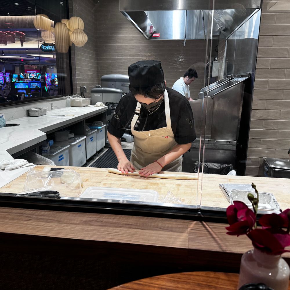 The Noodle Den - Working on soup dumplings. - Chinese Near Me - Las Vegas, Nevada The Noodle Den - Working on soup dumplings. - Chinese Near Me - Las Vegas, Nevada