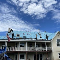 Paragon Roofing - Hard working crew on the roof!