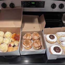 Oni Onoz - Butter rolls, hot dog, pizza, strawberry cookie butter cinnamon rolls, half moons, and napoleons