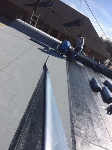 Slide of DKG Roofing Contractor