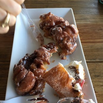 Babe's Doughnut - We got too hungry and forgot to take a photo first  apple fritter and half the Strawberry Nutella Donut. - Donuts Near Me - Bryan, Texas