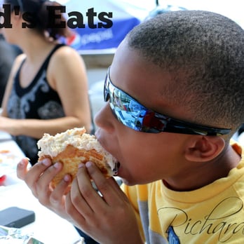 Red's Eats - Little fella enjoying his "crabby patty" roll as he put it. - Seafood Near Me - Wiscasset, Maine