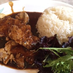 Pork chop with steamed rice in honey black pepper sauce, yum!