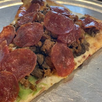 Johnny's New York Style Pizza - When does the cheese get added?  Toppings just falling everywhere‍ - Italian Near Me - Buford, Georgia