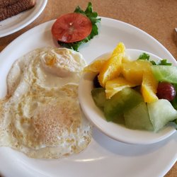 Humpty's Family Restaurants - Toast two eggs and a fruit bowl.